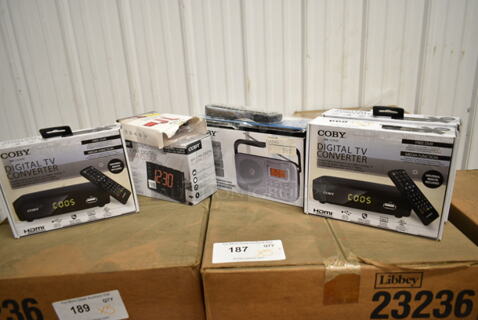 7 Various BRAND NEW Items Including 3 Coby CSTB-600 Digital TV Converters, Coby Universal Remote, Coby CR-201 Radio, Coby CETW512-RED Wireless Earbuds, Coby CBCR-103 AM/FM Digital Alarm Clock. 7 Times Your Bid! 