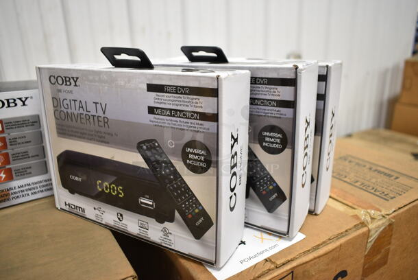 7 Various BRAND NEW Items Including 3 Coby CSTB-600 Digital TV Converters, Coby Universal Remote, Coby CR-201 Radio, Coby CETW512-RED Wireless Earbuds, Coby CBCR-103 AM/FM Digital Alarm Clock. 7 Times Your Bid!  - Image 2 of 12