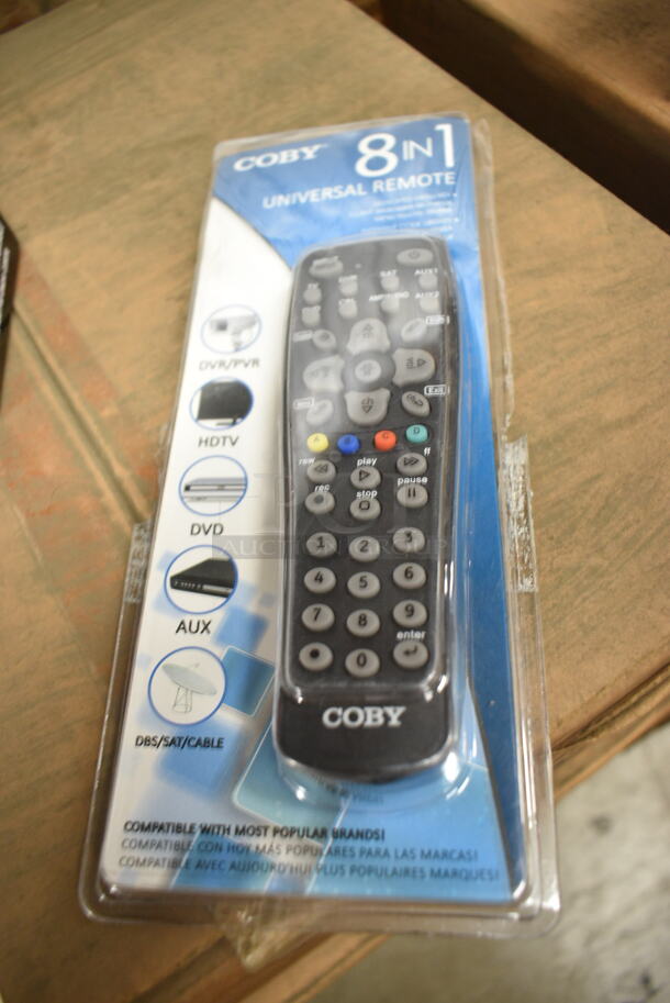 7 Various BRAND NEW Items Including 3 Coby CSTB-600 Digital TV Converters, Coby Universal Remote, Coby CR-201 Radio, Coby CETW512-RED Wireless Earbuds, Coby CBCR-103 AM/FM Digital Alarm Clock. 7 Times Your Bid!  - Image 4 of 12