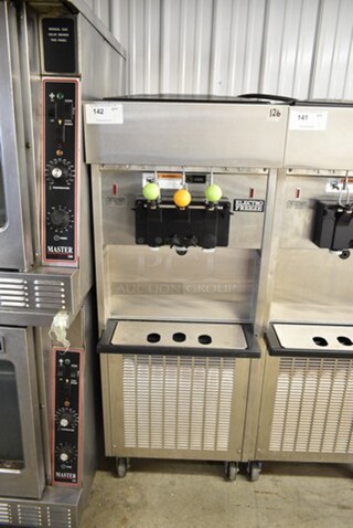 Electro Freeze SL500-132 Stainless Steel Commercial Floor Style Water Cooled 2 Flavor w/ Twist Soft Serve Ice Cream Machine on Commercial Casters. 208-230 Volts, 3 Phase. 