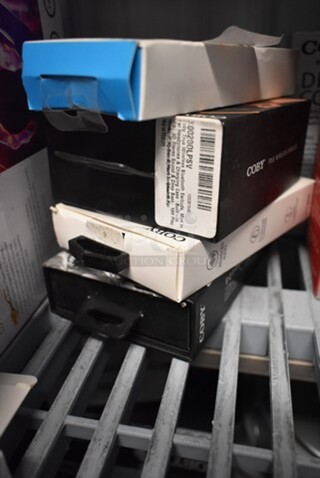 4 BRAND NEW IN BOX! Items Including 2 Coby Earbuds, Coby CV-55 Headphones, Coby Intense Wireless Earbuds. 4 Times Your Bid!