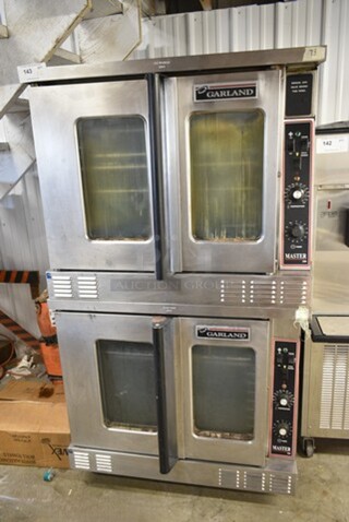 2 Garland MCO-GS-10S Master 200 Stainless Steel Commercial Natural Gas Powered Full Size Convection Oven w/ View Through Doors, Metal Oven Racks and Thermostatic Controls on Commercial Casters. 60,000 BTU. 2 Times Your Bid! 