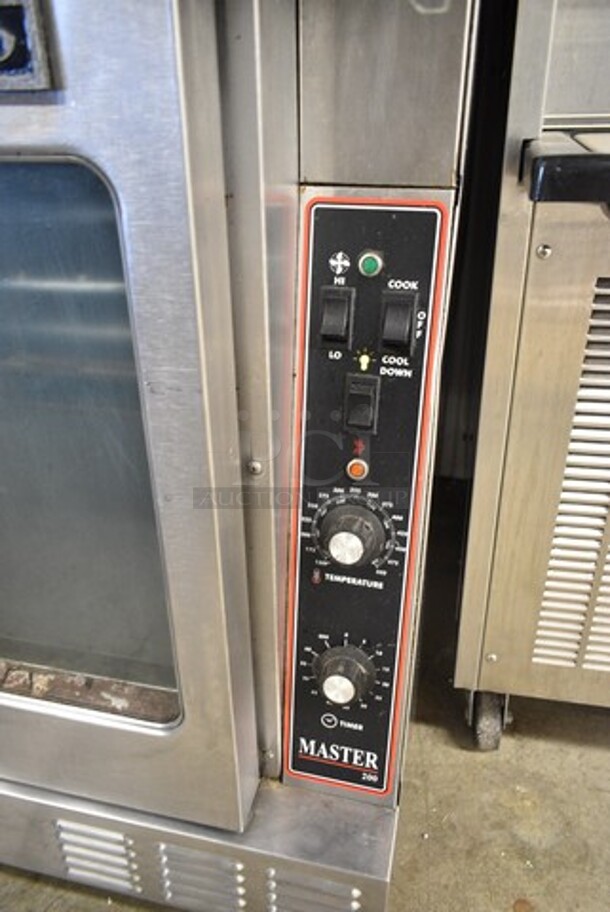 2 Garland MCO-GS-10S Master 200 Stainless Steel Commercial Natural Gas Powered Full Size Convection Oven w/ View Through Doors, Metal Oven Racks and Thermostatic Controls on Commercial Casters. 60,000 BTU. 2 Times Your Bid!  - Image 5 of 9