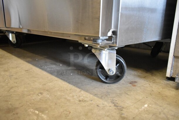 BRAND NEW SCRATCH AND DENT! 2023 Avantco 178SSWT48FHC Stainless Steel Commercial 2 Door Work Top Freezer. 115 Volts, 1 Phase. Tested and Working! - Image 4 of 7