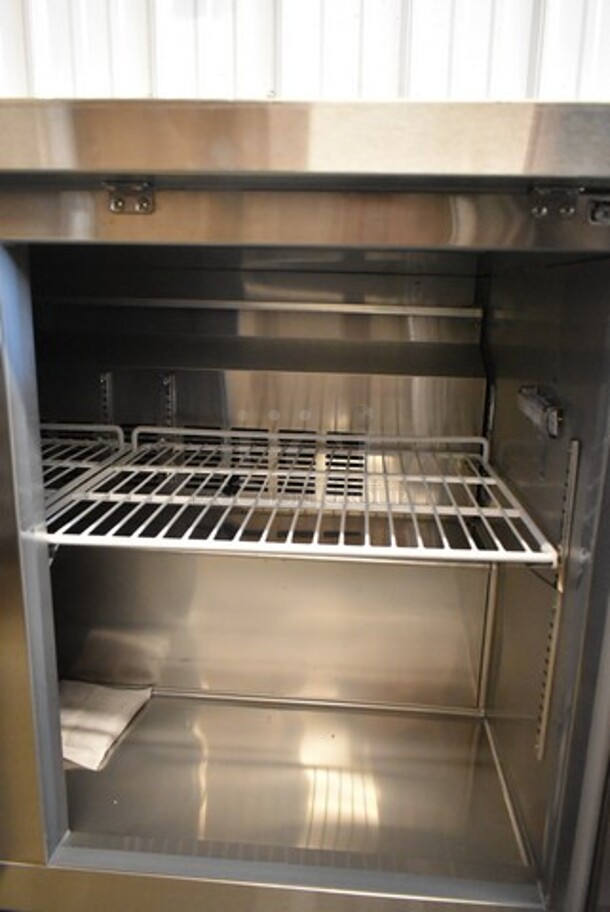 BRAND NEW SCRATCH AND DENT! 2023 Avantco 178SSWT48FHC Stainless Steel Commercial 2 Door Work Top Freezer. 115 Volts, 1 Phase. Tested and Working! - Image 5 of 7