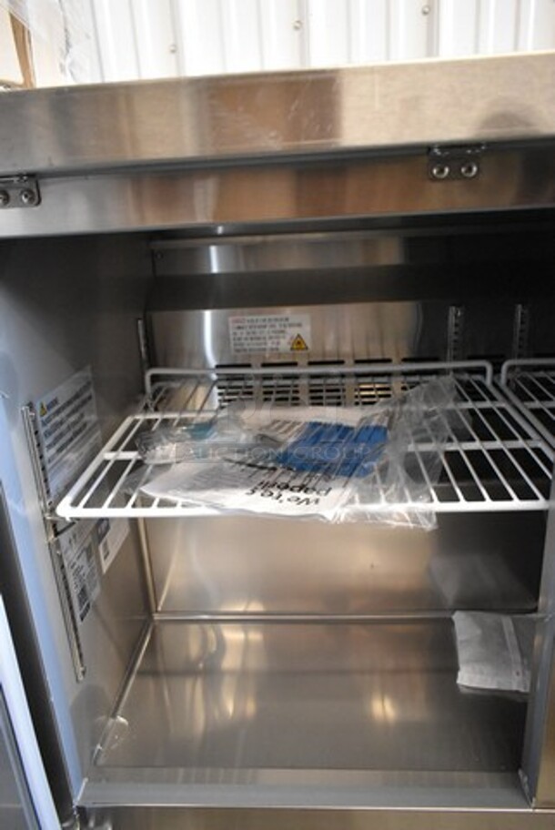 BRAND NEW SCRATCH AND DENT! 2023 Avantco 178SSWT48FHC Stainless Steel Commercial 2 Door Work Top Freezer. 115 Volts, 1 Phase. Tested and Working! - Image 6 of 7