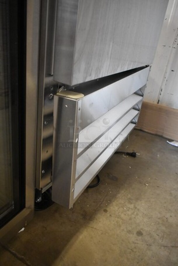 BRAND NEW SCRATCH AND DENT! 2024 Avantco 178A23FHC Stainless Steel Commercial Single Door Reach In Freezer w/ Poly Coated Racks on Commercial Casters. 115 Volts, 1 Phase. Tested and Working! - Image 3 of 7