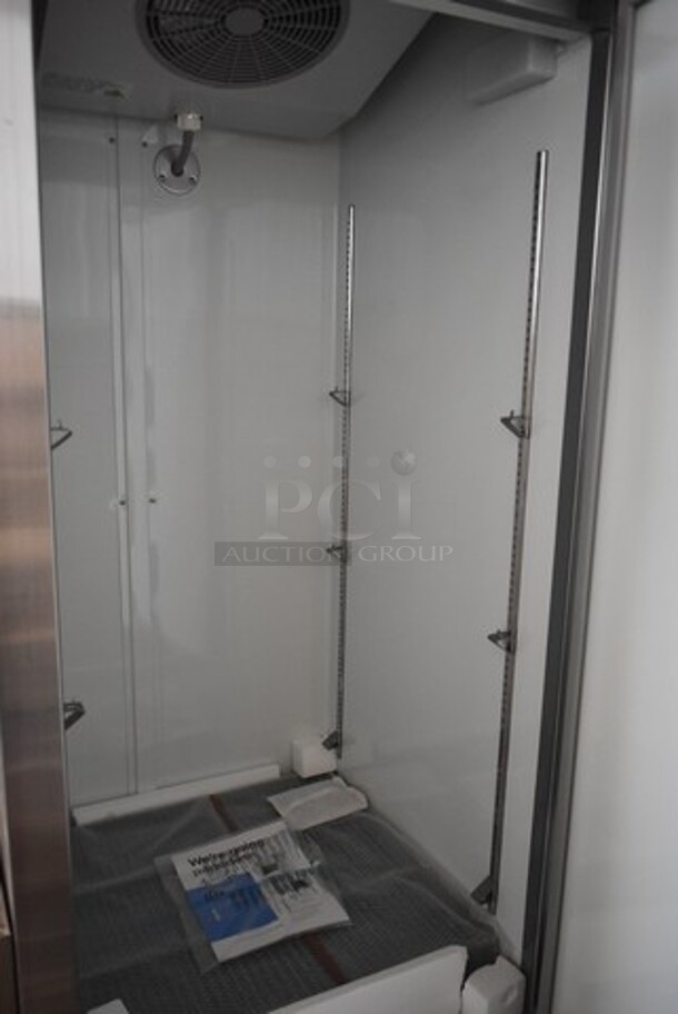 BRAND NEW SCRATCH AND DENT! 2024 Avantco 178A23FHC Stainless Steel Commercial Single Door Reach In Freezer w/ Poly Coated Racks on Commercial Casters. 115 Volts, 1 Phase. Tested and Working! - Image 5 of 7
