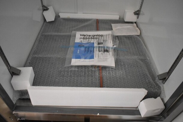 BRAND NEW SCRATCH AND DENT! 2024 Avantco 178A23FHC Stainless Steel Commercial Single Door Reach In Freezer w/ Poly Coated Racks on Commercial Casters. 115 Volts, 1 Phase. Tested and Working! - Image 6 of 7