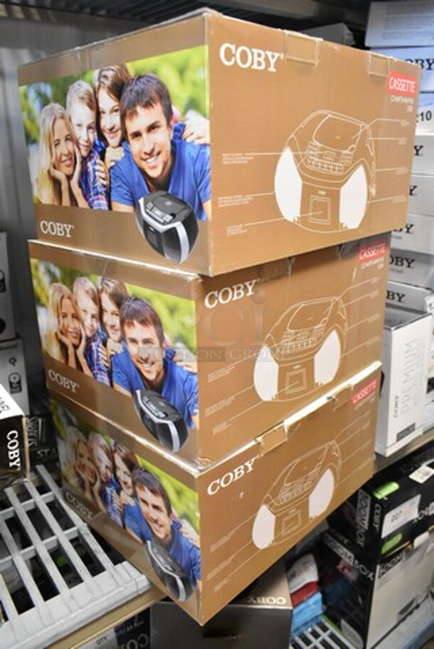 4 BRAND NEW IN BOX! Coby MPCD-102-BLK Cassette Radio Player. 4 Times Your Bid! - Image 1 of 5