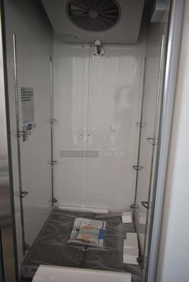 BRAND NEW SCRATCH AND DENT! 2024 Avantco 178A23RHC Stainless Steel Commercial Single Door Reach In Cooler w/ Poly Coated Racks on Commercial Casters. 115 Volts, 1 Phase. Tested and Working! - Image 5 of 7
