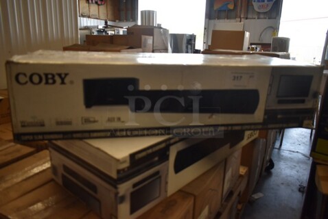 BRAND NEW SCRATCH AND DENT! Coby CSMP95 Super Slim Soundbar. 