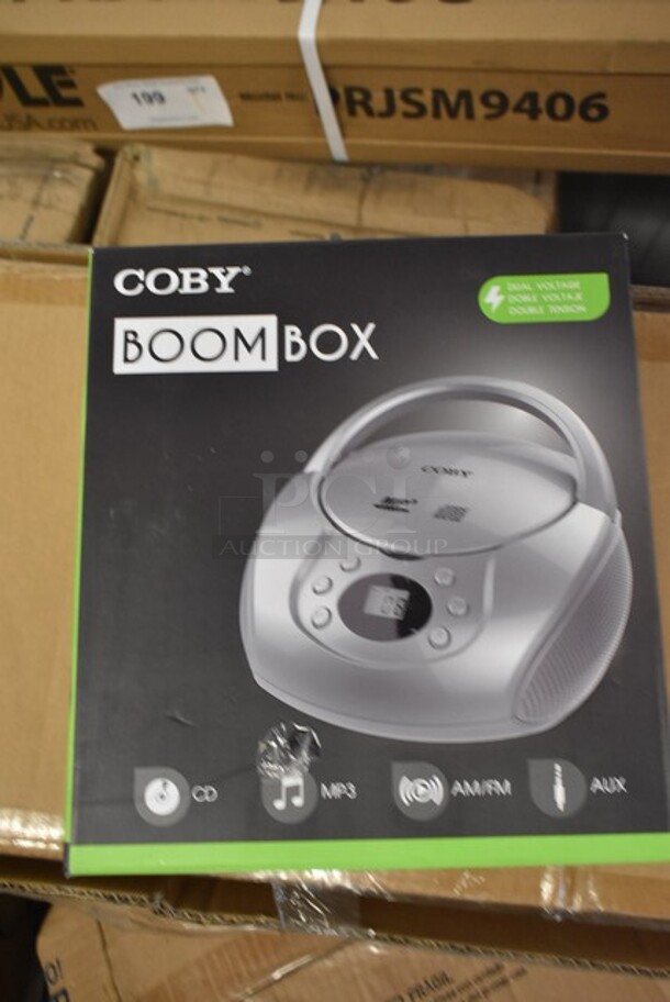 4 BRAND NEW IN BOX! Coby CBCD-04-SLV Boom Box. 4 Times Your Bid! - Image 1 of 3
