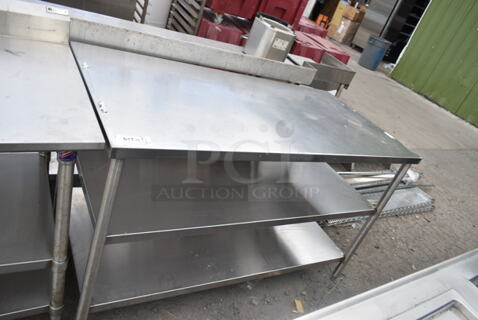 Stainless Steel Table w/ 2 Under Shelves. 