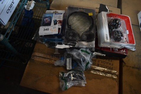 12 BRAND NEW! Various Items Including Coby MP3, Coby Headphones. 12 Times Your Bid! 