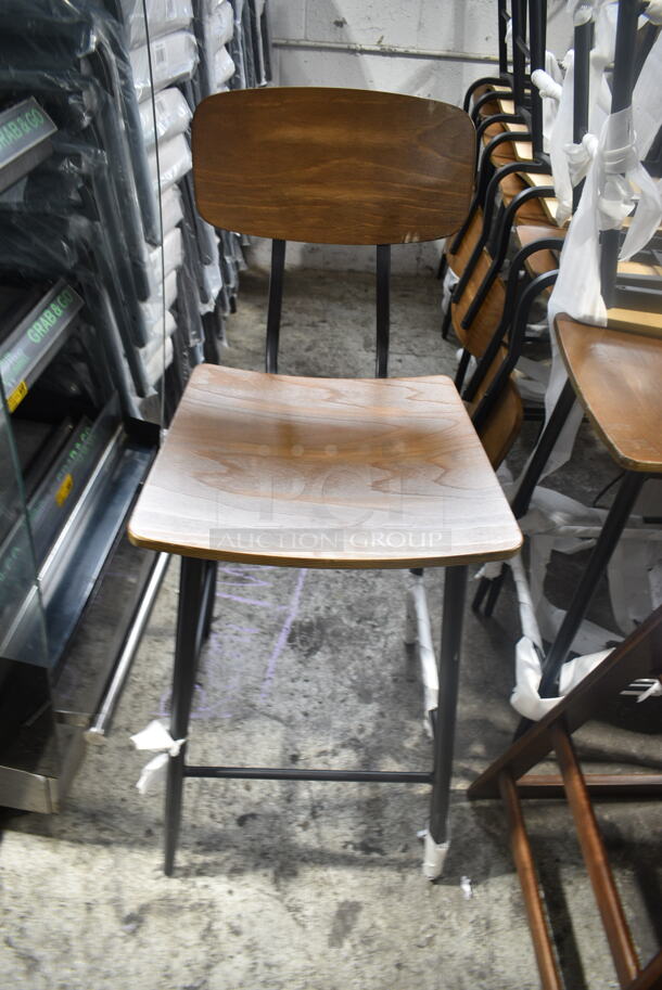 10 BRAND NEW SCRATCH AND DENT! Lancaster Table & Seating Black Metal Bar Height Chair w/ Wooden Seat and Back Rest. 10 Times Your Bid! - Image 1 of 5