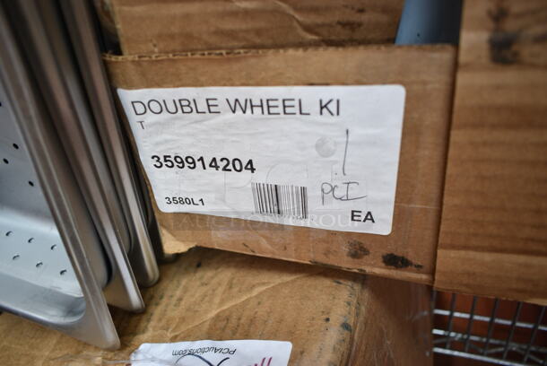 3 BRAND NEW SCRATCH AND DENT! Various Items Including 35912011471 Regency 5" Polyurethane Work Table and Equipment Stand Caster, 359914204 Shortening Shuttle® 914-204 8" Double Wheel Kit for SS-914W, 460BLKMOBSET Regency 5" Black Polyurethane Swivel Shelving Stem Casters - 4/Pack. 3 Times Your Bid!  - Image 4 of 5