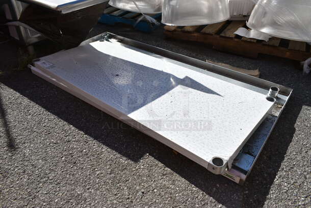 BRAND NEW SCRATCH AND DENT! Regency 600T3060G 30" x 60" 18-Gauge 304 Stainless Steel Commercial Work Tabletop and Undershelf. No Legs.  - Image 2 of 4