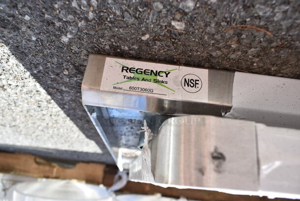 BRAND NEW SCRATCH AND DENT! Regency 600T3060G 30" x 60" 18-Gauge 304 Stainless Steel Commercial Work Tabletop and Undershelf. No Legs.  - Image 4 of 4