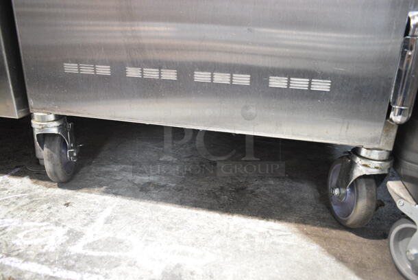 2016 Alto Shaam 1200-UP Stainless Steel Commercial Mobile 16 Pan Dutch Door Holding Cabinet with Universal Racks on Commercial Casters. 208-240 Volts, 1 Phase.  - Image 3 of 10