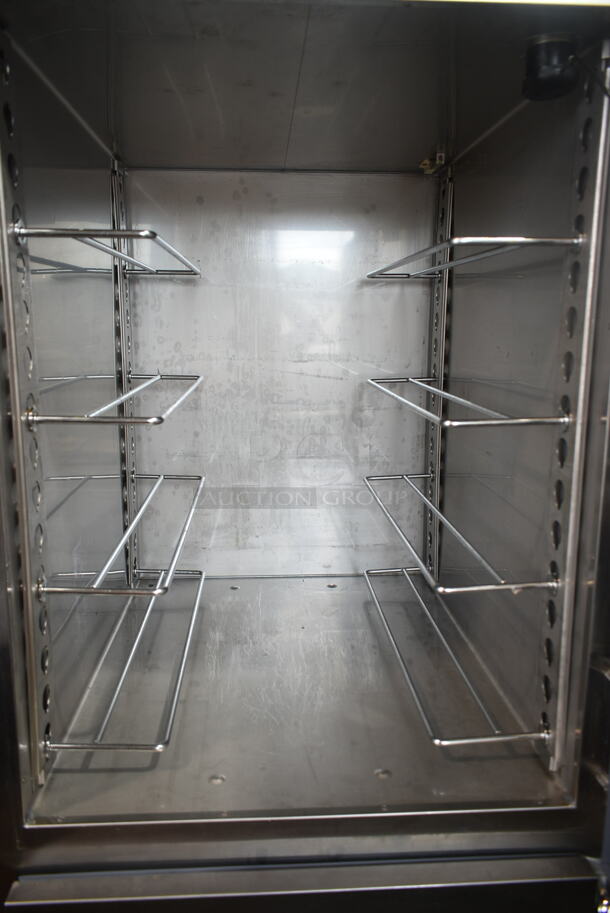 2016 Alto Shaam 1200-UP Stainless Steel Commercial Mobile 16 Pan Dutch Door Holding Cabinet with Universal Racks on Commercial Casters. 208-240 Volts, 1 Phase.  - Image 7 of 10