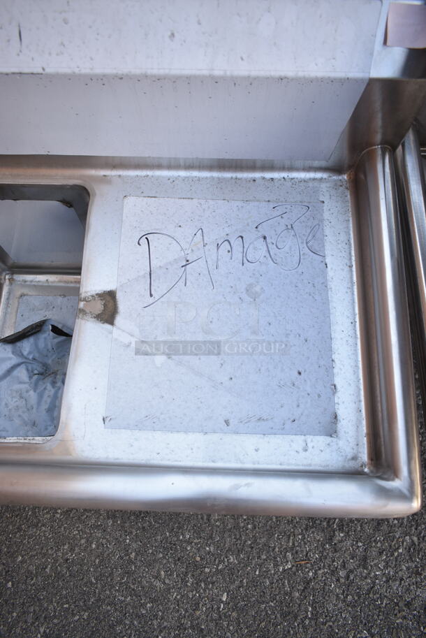 BRAND NEW SCRATCH AND DENT! Regency 600S31014216 66" 16-Gauge Stainless Steel Three Compartment Commercial Sink with Galvanized Steel Legs and 2 Drainboards - 10" x 14" x 12" Bowls. No Legs.  - Image 4 of 9