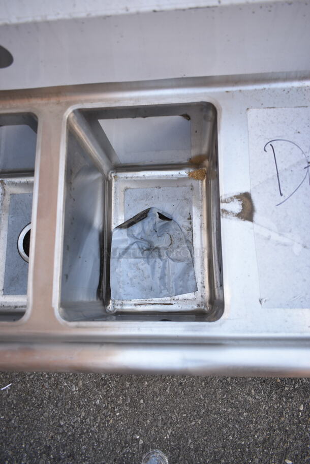 BRAND NEW SCRATCH AND DENT! Regency 600S31014216 66" 16-Gauge Stainless Steel Three Compartment Commercial Sink with Galvanized Steel Legs and 2 Drainboards - 10" x 14" x 12" Bowls. No Legs.  - Image 5 of 9