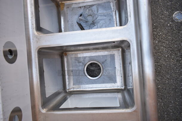 BRAND NEW SCRATCH AND DENT! Regency 600S31014216 66" 16-Gauge Stainless Steel Three Compartment Commercial Sink with Galvanized Steel Legs and 2 Drainboards - 10" x 14" x 12" Bowls. No Legs.  - Image 6 of 9