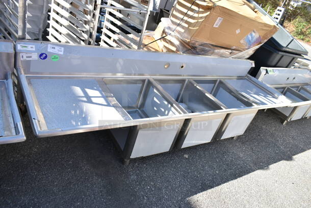 BRAND NEW SCRATCH AND DENT! Regency 600S31824224 Stainless Steel Commercial 3 Bay Sink w/ Dual Drain Boards. No Legs. Bays 18x23x14. Drain Boards 22.5x25.5. No Legs. - Image 2 of 9