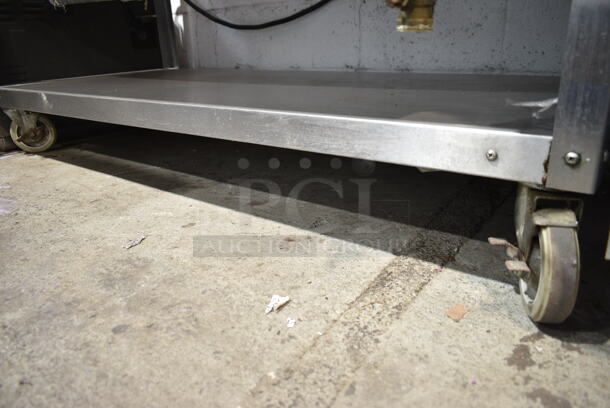 Vollrath 38104 Stainless Steel Commercial Electric Powered 4 Bay Steam Table w/ Under Shelf on Commercial Casters. 120 Volts 1 Phase. Cannot Test Due To Plug Style - Image 6 of 7