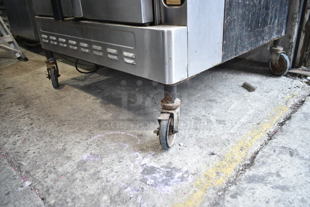 2 Blodgett Stainless Steel Commercial Natural Gas Powered Full Size Convection Ovens w/ Solid Doors, Metal Oven Racks and Thermostatic Controls on Commercial Casters. 2 Times Your Bid!  - Image 3 of 9