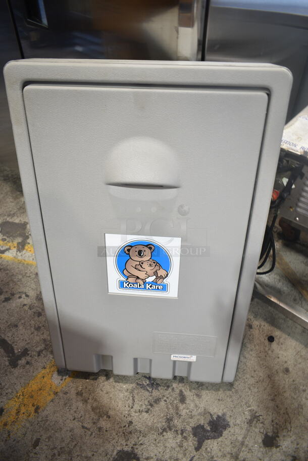 Koala Kare Gray Poly Wall Mount Diaper Changing Station.  - Image 1 of 7