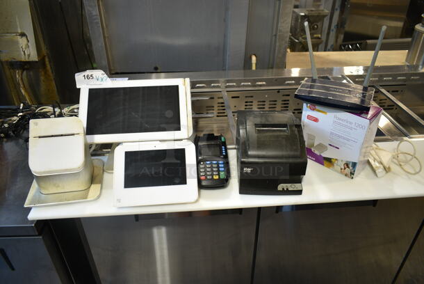 7 Various Items Including Clover C100 POS Monitor, Clover P100 Receipt Printer, TP Link Router, Netgear Powerline 1200 Internet Extender, Star SP700 Receipt Printer, Credit Card Reader. 7 Times Your Bid!  - Image 1 of 12