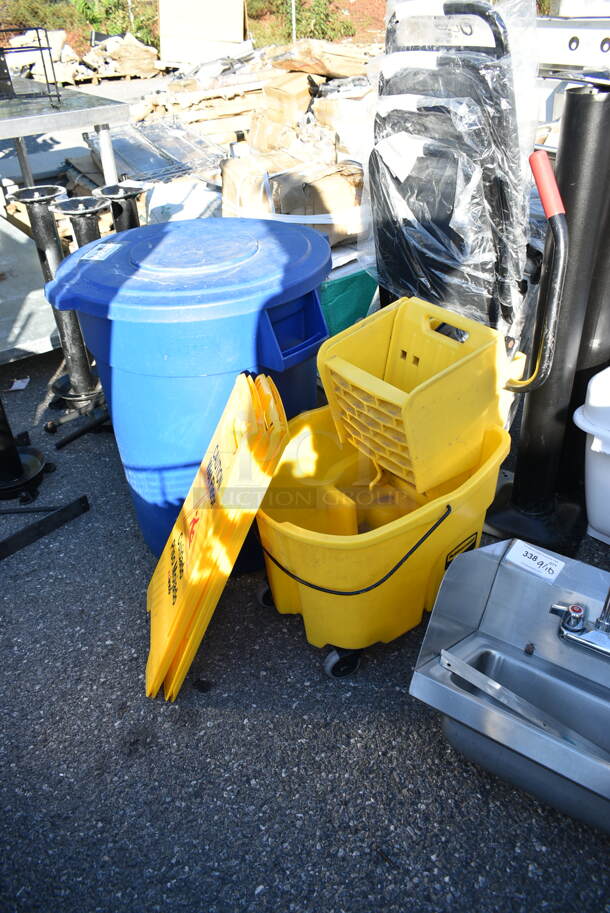 4 Various Items; Yellow Mop Bucket, 2 Wet Floor Caution Signs and 1 Blue Trash Can. 4 Times Your Bid!  - Image 1 of 10