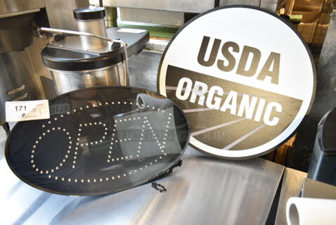2 Signs; Light Up Open Sign and USDA Organic Sign. Open Sign Is Working! 21x2.5x13, 22x0.5x22. 2 Times Your Bid! 