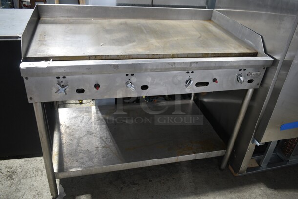 Jade Range JGT-2448-F Stainless Steel Commercial Natural Gas Powered Flat Top Griddle w/ Under Shelf. 24,000 BTU.  - Image 1 of 5