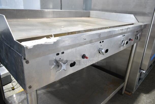 Jade Range JGT-2448-F Stainless Steel Commercial Natural Gas Powered Flat Top Griddle w/ Under Shelf. 24,000 BTU.  - Image 2 of 5