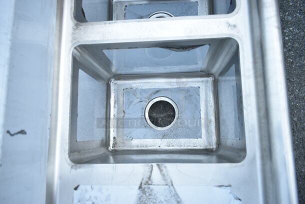 BRAND NEW SCRATCH AND DENT! Regency 600S31014216  66" 16-Gauge Stainless Steel Three Compartment Commercial Sink with Galvanized Steel Legs and 2 Drainboards - 10" x 14" x 12" Bowls. No Legs.  - Image 7 of 9