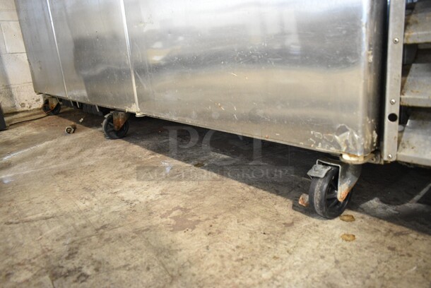 Blue Air BSF72T Stainless Steel Commercial 3 Door Reach In Freezer w/ Poly Coated Racks on Commercial Casters. 115 Volts, 1 Phase. Cannot Test Due To Plug Style - Image 3 of 8