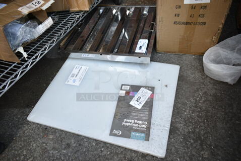 2 BRAND NEW SCRATCH AND DENT! Items Including Choice 407241875WH 24" x 18" x 3/4" White Polyethylene Cutting Board and Steelton 522HF2020  20"(H) x 20"(W) x 1 1/2"(T) Stainless Steel Hood Filter. 2 Times Your Bid! 