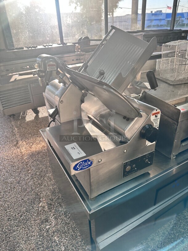 Globe Commercial Meat Slicer With Blade Sharpener 115 Volt NSF - Image 1 of 8