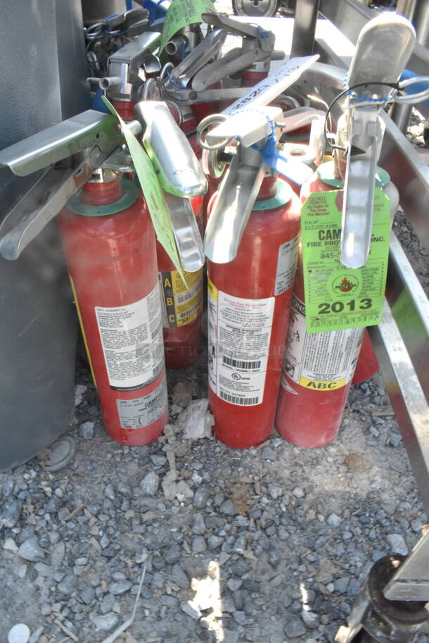 12 Fire Extinguishers. 12 Times Your Bid! Buyer Must Pick Up - We Will Not Ship This Item.
 - Image 1 of 4