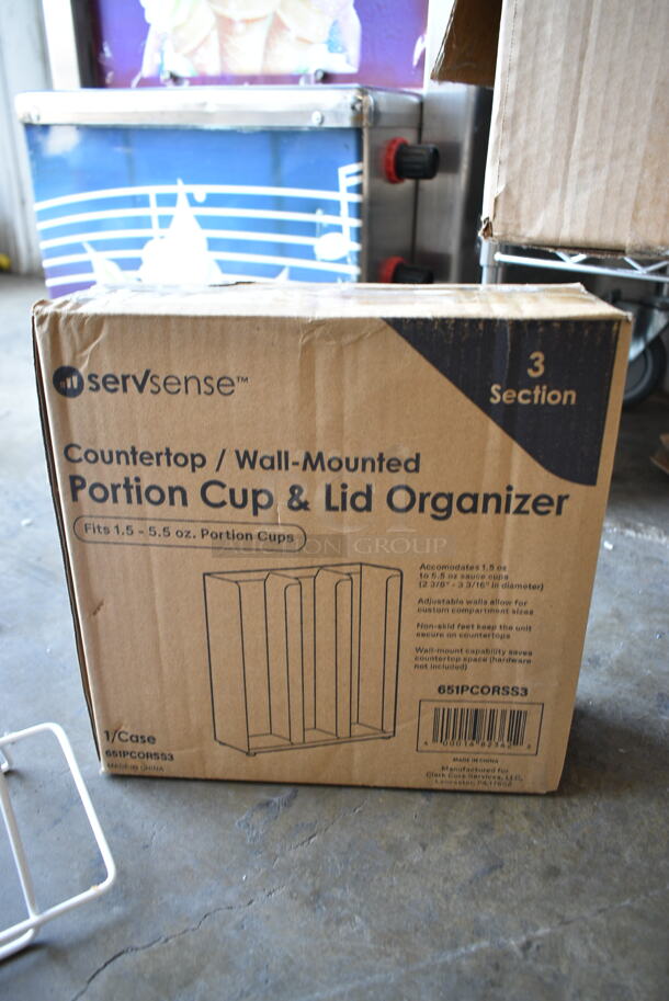 3 BRAND NEW SCRATCH AND DENT! Items Including 651PCORSS3 ServSense Adjustable 3-Section Stainless Steel Wall-Mount / Countertop 1.5 - 5.5 oz. Portion Cup / Lid Organizer, 208SCPHLDLG Choice Wall Mount Large Scoop Holder, ServSense Adjustable 4-Section Stainless Steel Wall-Mount / Countertop 1.5 - 5.5 oz. Portion Cup / Lid Organizer. 3 Times Your Bid!  - Image 5 of 8