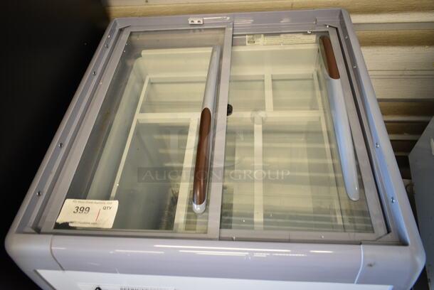 BRAND NEW SCRATCH AND DENT! Avantco 360ADCGEL4 White Metal Floor Style Display Freezer Merchandiser on Commercial Casters. 115 Volts, 1 Phase. Tested and Powers On But Does Not Get Cold - Image 4 of 8