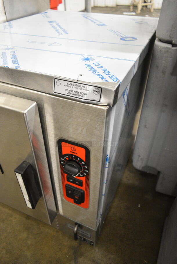 BRAND NEW SCRATCH AND DENT! Vulcan C24EO5AF Stainless Steel Commercial Countertop Electric Powered Single Deck Steam Cabinet. 240 Volts, 3/1 Phase. - Image 5 of 11