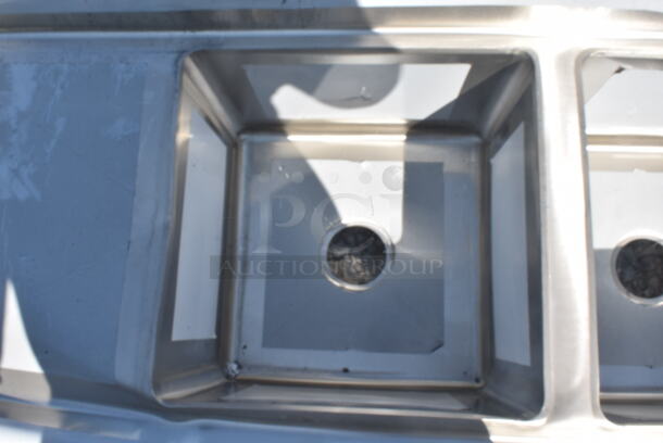 	BRAND NEW SCRATCH AND DENT! Regency 600S31515215 79" 16-Gauge Stainless Steel Three Compartment Commercial Sink with Galvanized Steel Legs and 2 Drainboards - 15" x 15" x 12" Bowls. No Legs. - Image 7 of 8
