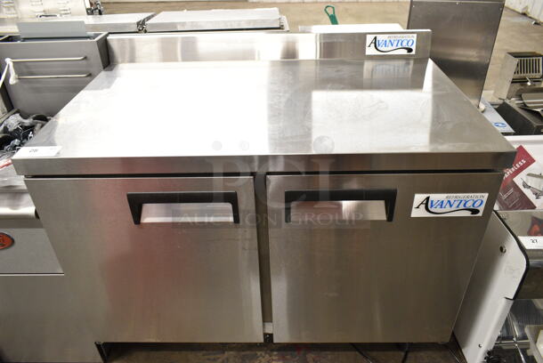 BRAND NEW SCRATCH AND DENT! 2024 Avantco 178AWT48FHC Stainless Steel Commercial 2 Door Work Top Cooler on Commercial Casters. Unit Was Mislabeled From Manufacturer and is a Cooler, Not a Freezer. 115 Volts, 1 Phase. Tested and Working! - Image 2 of 7