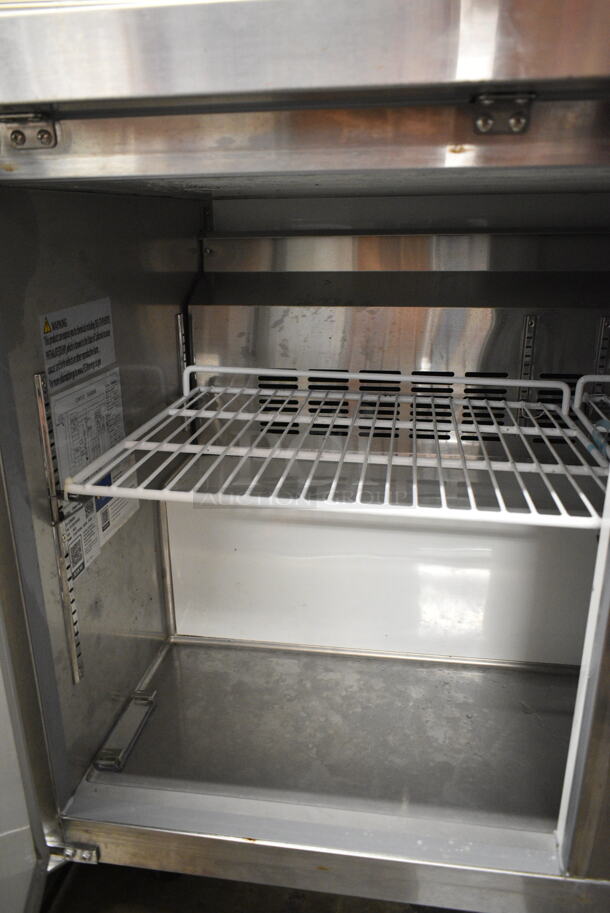 BRAND NEW SCRATCH AND DENT! 2024 Avantco 178AWT48FHC Stainless Steel Commercial 2 Door Work Top Cooler on Commercial Casters. Unit Was Mislabeled From Manufacturer and is a Cooler, Not a Freezer. 115 Volts, 1 Phase. Tested and Working! - Image 6 of 7