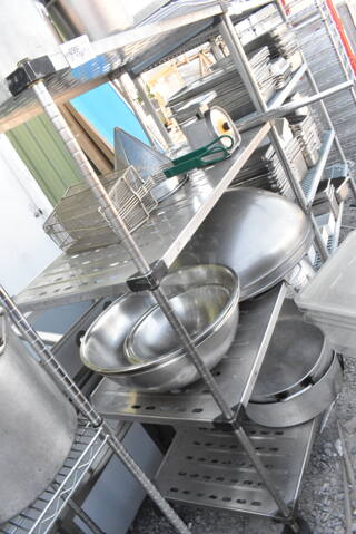 Metal 4 Tier Wire Shelving Unit on Commercial Casters w/ Contents Including Metal Fry Baskets, Metal Bowls and Scale. BUYER MUST DISMANTLE. PCI CANNOT DISMANTLE FOR SHIPPING. PLEASE CONSIDER FREIGHT CHARGES.