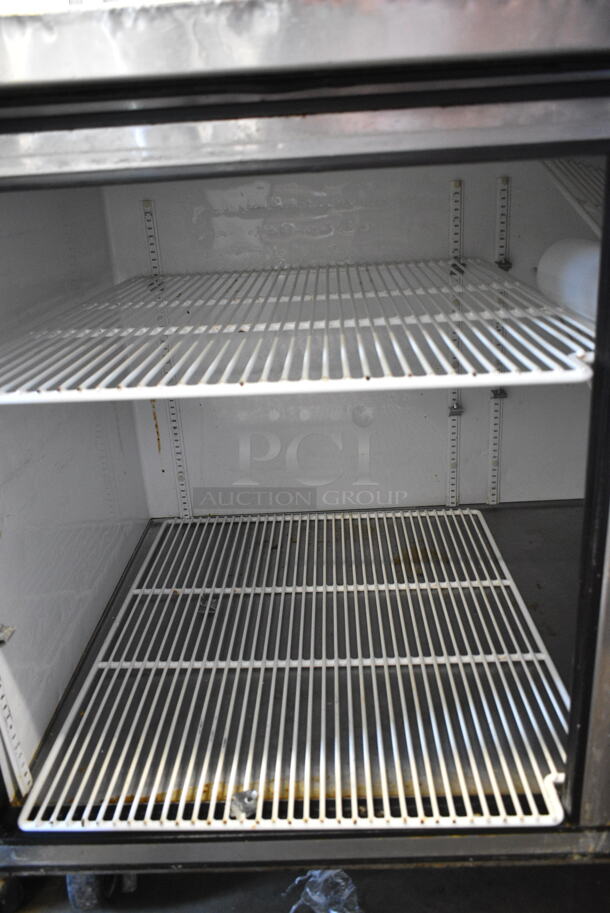 True TWT-67 Stainless Steel Commercial 2 Door Work Top Cooler on Commercial Casters. 1 Caster Needs Repair. 115 Volts, 1 Phase. Tested and Working! - Image 5 of 6